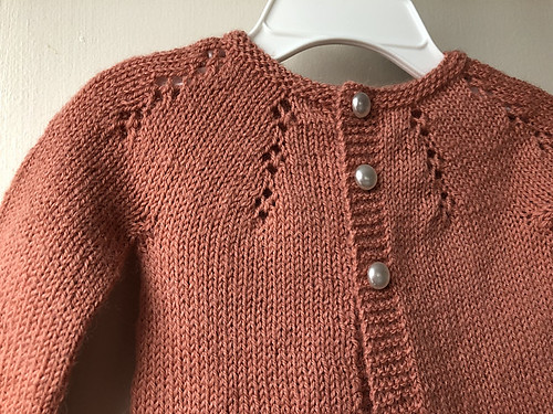 Closeup of Lise’ Fairy Dust knit using Drops Flora