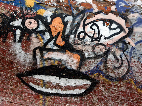 Graffitied boat in the counter-culture area of Copenhagen called Christiania, Denmark