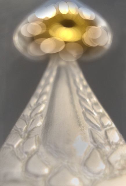 close-up photo of silvery spoon with reflections