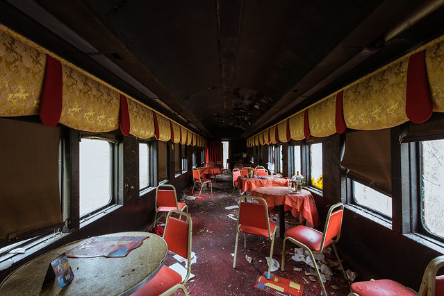 An abandoned train diner restaurant