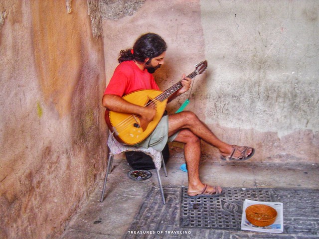 While walking through the Albaicín, you will hear music, specifically flamenco and other traditional Spanish music echoing off the walls. This musician was playing their guitar in the Albaicín, under one of the gates of the city. No visit to the south of
