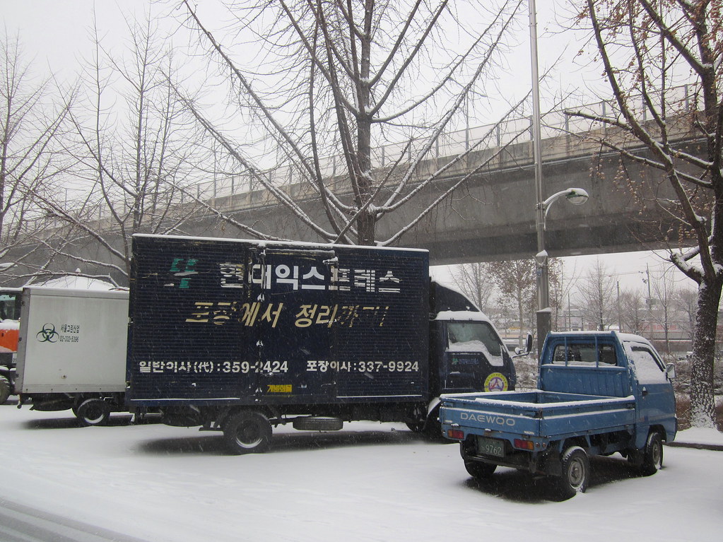 Seoul Korea vintage trucks parked near Hongje stream December 2012 - 