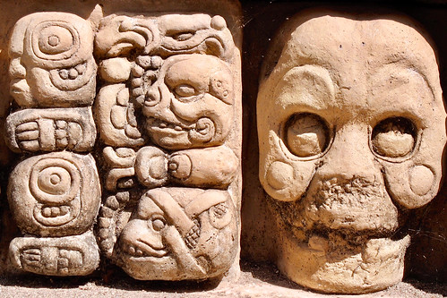 abstract stone ruins mayan skull glyph sculpture brown travel honduras