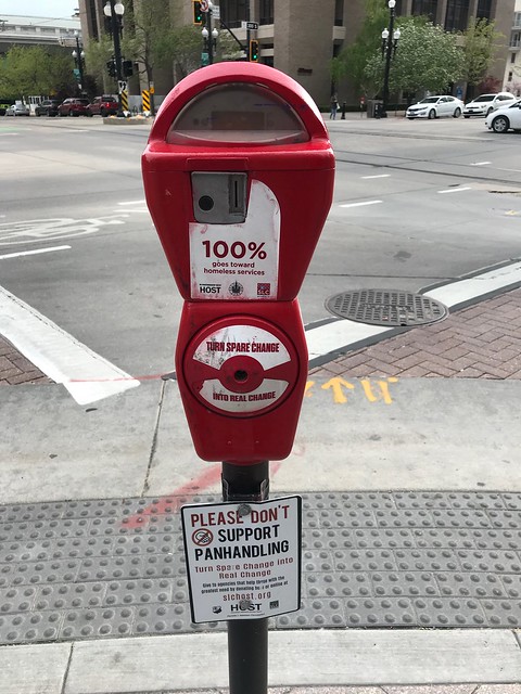 Anti-panhandling parking meter