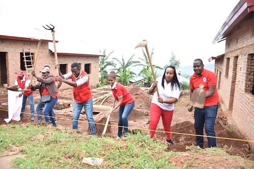 Every last saturday of the month Rwanda Red Cross Volunteers, Staff, friends and members join local authorities and dignitaries, without exception. They roll up sleeves, grab a hoe and dig ditches, clears shrubs with community. This activity is locally kn | by mundermutoni