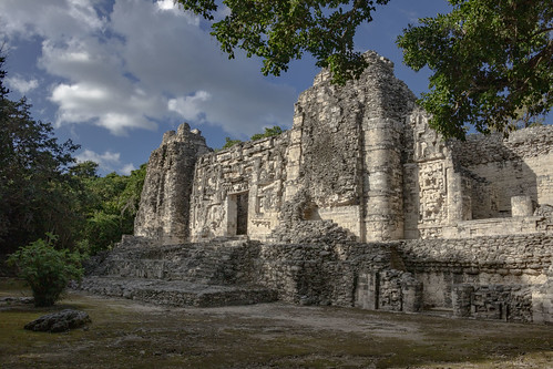 ancient old mexico ruins pyramid pyramids chaac itzamna mouth serpent blue sky clouds rainforest trees maya art architecture archeology archeological site el hormiguero campeche relief calakmul reserve
