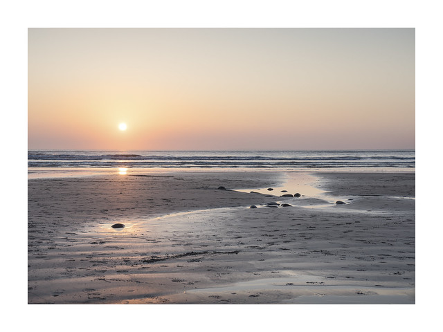 Sunset on pebble beach