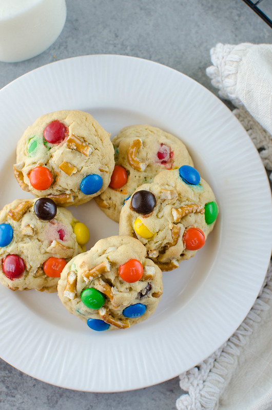 Sweet and Salty Pudding Cookies - soft cookies filled with coconut, pretzels, and M&Ms! The pudding mix keeps them soft for days. 