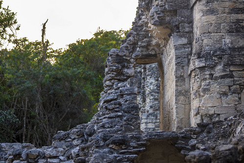 rocks ruins old ancient bricks structure 2 el hormiguero calakmul reserve campeche mexico maya archeological site mayan art architecture archeology arch trees sunset rainforest green leaves