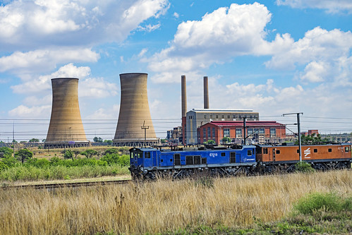powerplant chemny plant factory coal vegetation train railway wagon landscape view scenery industrial sky clouds southafrica pretoria gauteng nikon d850