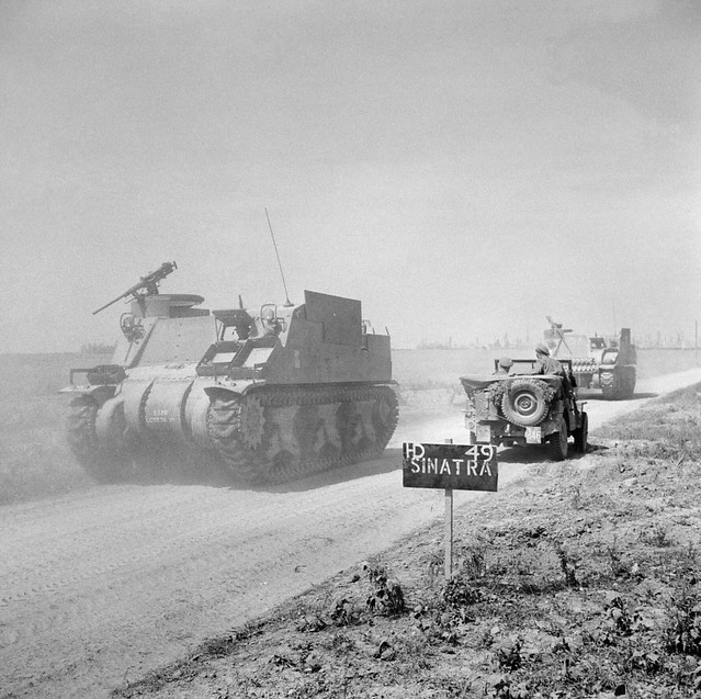 British Army in Normandy 1944 Priest infantry carriers move up to the front on the eve of Operation Totalise, 9 August 1944.