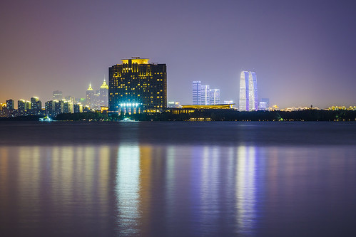 suzhou china gatetotheeast building skyline lake dushulake light evening night water city reflection longexposure