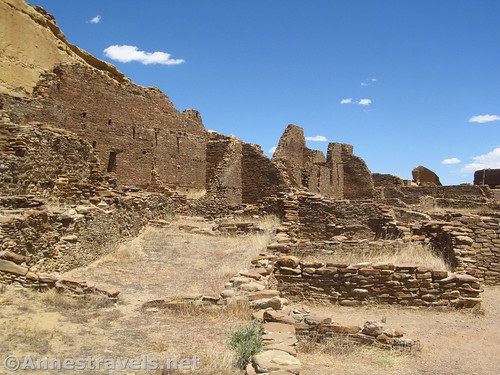 Walking through the western end of the ruins of Pueblo Bonito in Chaco Culture National Historical Park, New Mexico