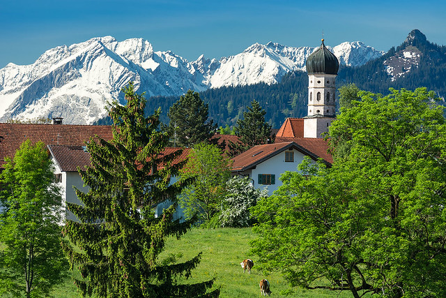 Bavarian Village in front of the Alps