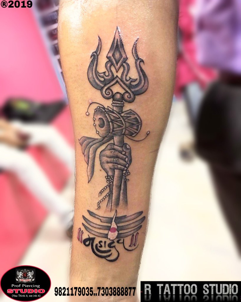 Trishul Tattoo | trishul with damru tattoo | shiva tattoo | samurai tattoo  mehsana | Hand tattoos for guys, Forearm band tattoos, Hand tattoos
