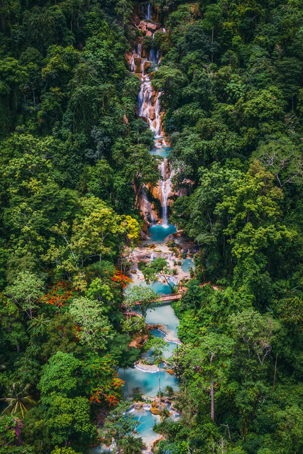 Aerial view of The Kuang Si Falls sometimes spelled Kuang Xi or known as Tat Kuang Si Waterfalls located in Luang Prabang, Laos