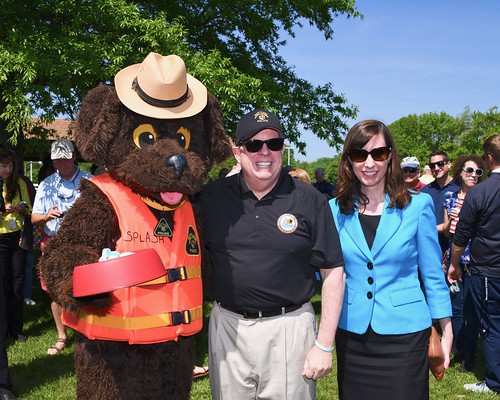 Photo of Splash the Water Safety Dog, Governor Larry Hogan and Natural Resources Secretary Jeannie Haddaway-Riccio