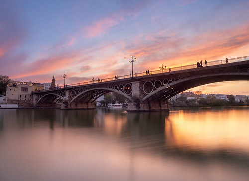 bridge architecture sevilla light spring spain outdoor perspective panasonic g5 andalusia 旅游 extérieur 欧洲 艺术 美丽 摄影 blueocean64 sunset sky ciel coucherdesoleil cloud longexposure water river nuages 12mm samyang