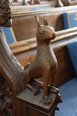 bench end: hare (15th Century, restored 19th Century)