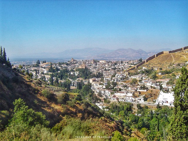 Views of the AlbaicÍn and the old gypsy neighborhood called Sacromonte from the foothills of the Sierra Nevada Mountains and the Mirador de La Abadía. You can also see the West Wall, the only remaining part of the old Moorish wall surrounding the Albaicín