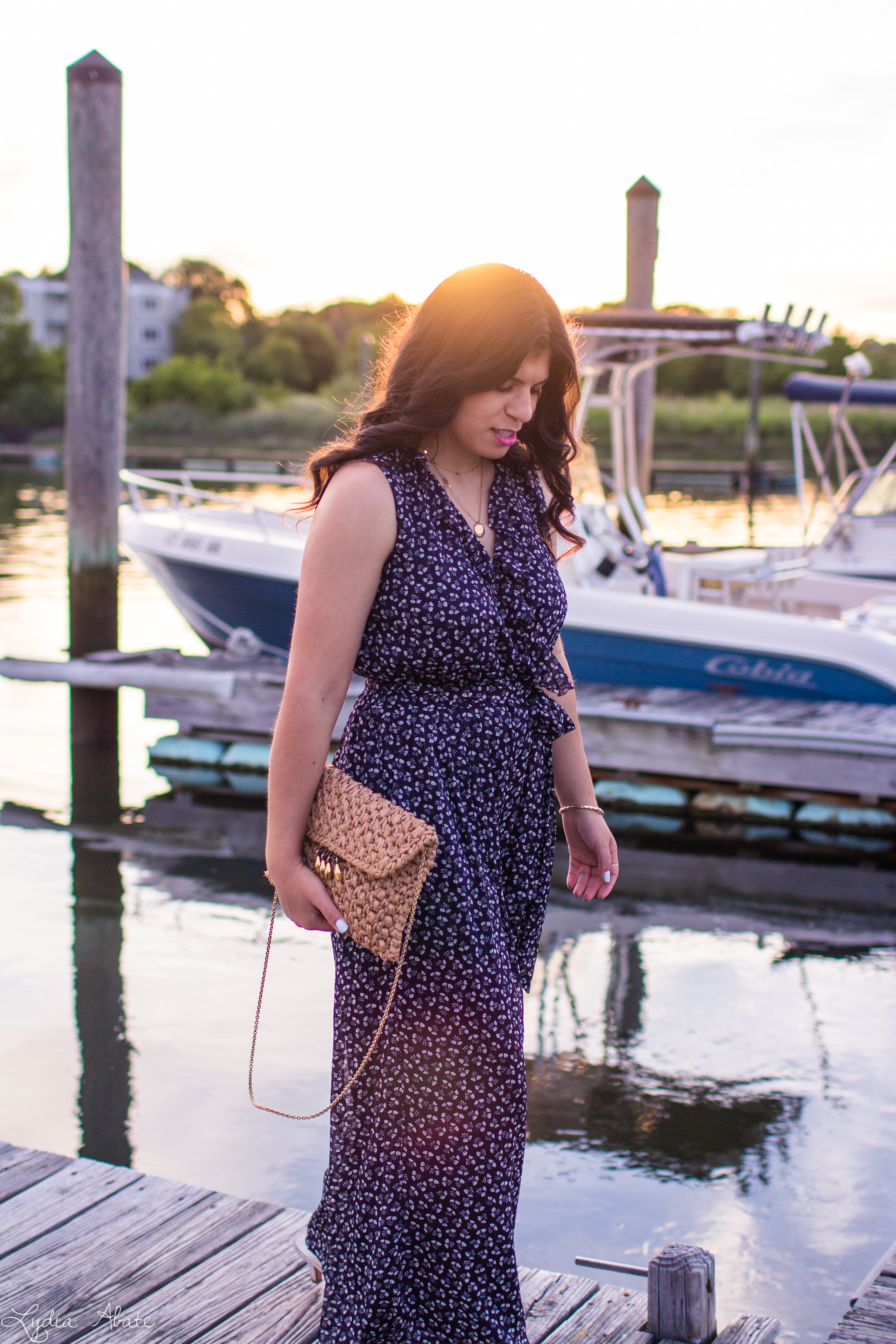 blue floral jumpsuit, straw clutch, white slides, summer outfit-16.jpg