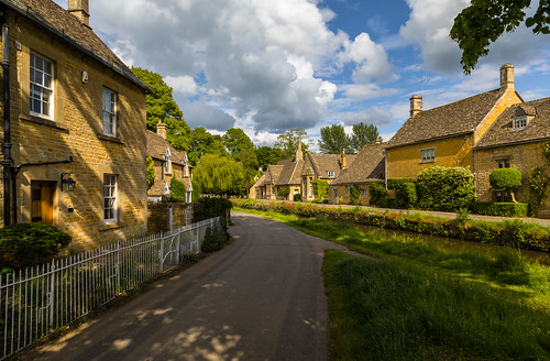 lowerslaughter cotswolds clouds houses rivereye