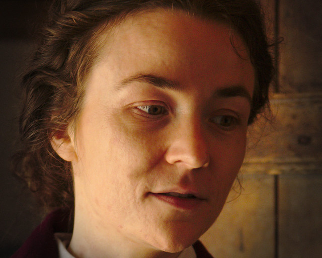 a charming Danish lady historian in the Eilschou Almshouses, Den Gamle By.