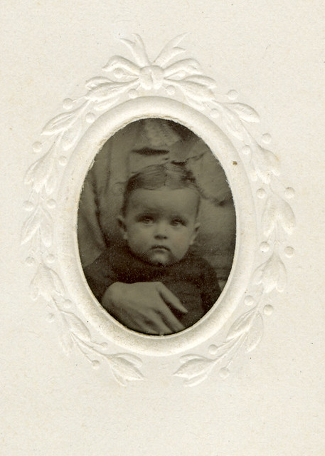 Gem Tintype of Baby with Hidden Mother's Hand