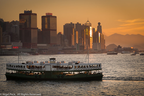 starferry sky ferry city mountains nikkorafs70200f28vr skyscrapers goldenhour water nikond3 buildings 攝影發燒友 boats sunset harbour sea boat hongkong