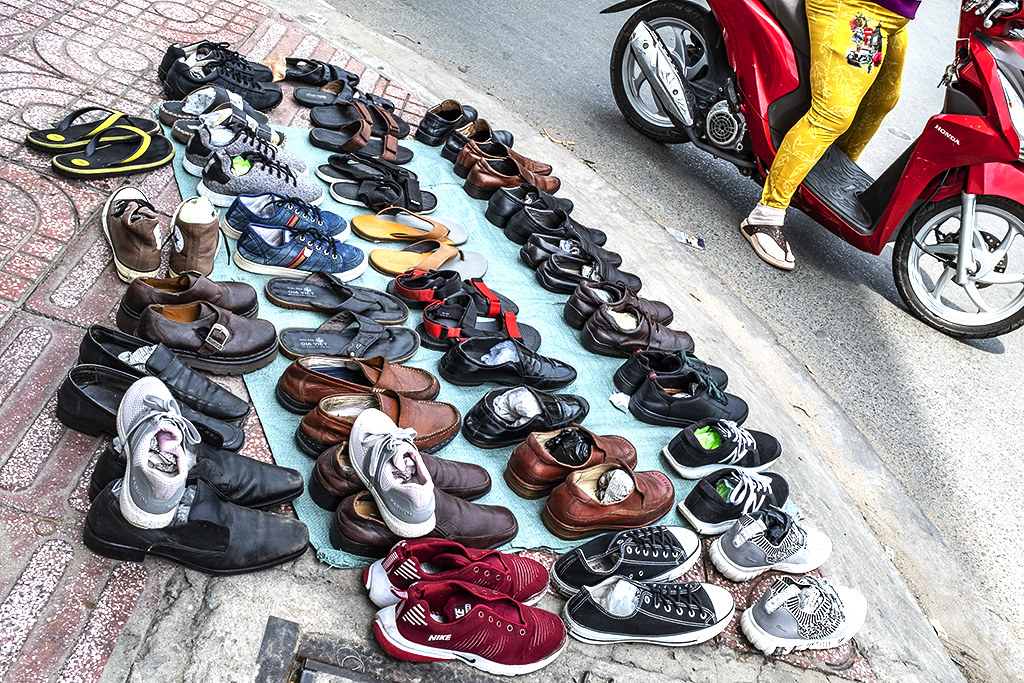Shoes for sale on District 6 sidewalk--Saigon