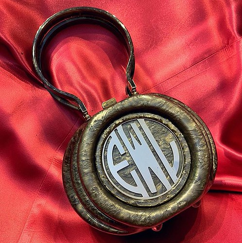 Original 1940s Llewellyn Art Deco pearlized lucite box purse available via Instagram and of course the brick and mortar! #stardayvintage #losfeliz #vintageclothingstore #artdeco #vivalasvegas #vlv #pinup #pinupstyle #mcm #rockabilly #rockabillystyle #rock | by stardayvintage