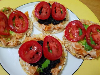 Rice cakes with Sweet potato, tahini dressing, avocado, tomato, Ikea vegan caviar
