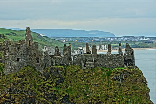 castle ireland northernireland sea hillside ruins green