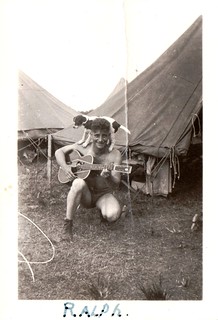 Ralph Schirf with dog and guitar