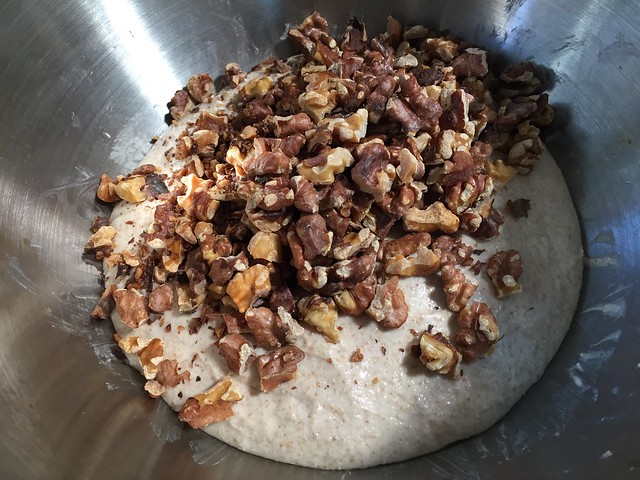 Mixing toasted walnuts