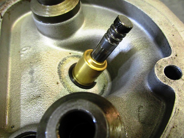 Valve Stem In Valve Guide Showing Cir-Clip That Secures The Guide in The Head