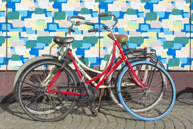 Red bike and blue tire