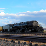 Rolling into Rawlins After a questionable experience on a bridge near Hanna, #4014 made up for lost time and ran towards Rawlins, Wyoming. Because of the delays, the light edged closer and closer towards the golden hour - not quite there, but certainly close, which was just enough for a brilliant view of the train rolling into town a few dozen yards from my hotel! Immediately after the train had passed, we stumbled down the embankment and crashed into our room, listening to the sound of the Big Boy in the distance as we ended the first day of many on the great race.