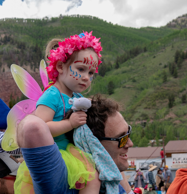 a fairy on her Daddy's shoulders