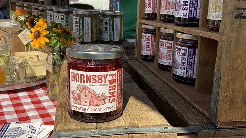 Jar of Hornsby Farms raspberry ghost pepper jelly.