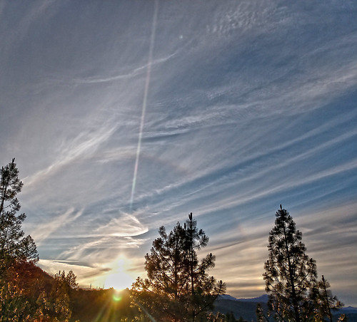 sky clouds lewiston california ca trees nature sunbeams light flare streak