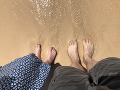 Toes in the pink sand beach Bermuda