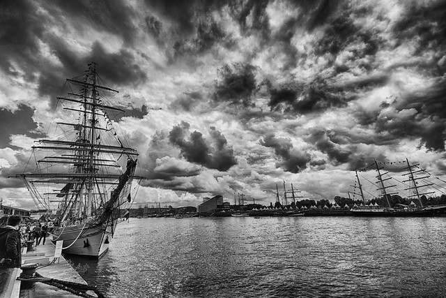 black & white fine art: summer storm clouds threaten the Rouen Armada (Tall ships) on the Seine. Rouen, Seine-Maritime, Normandie, France