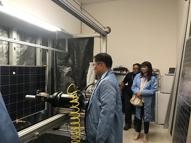 RETC, Jun Bella tests the solar panel's durability