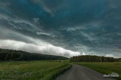 montana june summer nikond750 weather storm stormy severe thunderstorm evening road unpaved sigma14mmf18 fence rain lewistown clouds