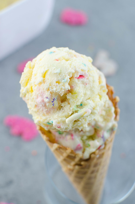 Circus Animal Cookie Ice Cream - homemade vanilla ice cream with frosting swirls, chopped circus animal cookies, and sprinkles. Such a fun treat for summer!