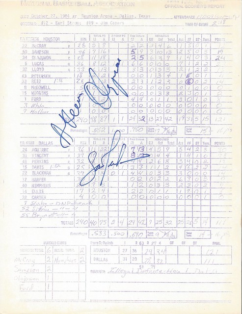 October 27, 1984, Akeem Olajuwon and Sam Perkins - First NBA Game - Dallas Mavericks vs Houston Rockets, Reunion Arena, Dallas, Texas - Signed Scorer's Report