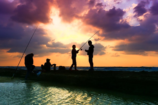 Fishing at sunset - Tel-Aviv beach