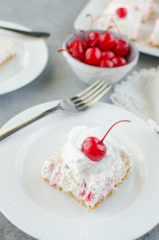 No Bake Million Dollar Pie Bars - sweet creamy bars filled with pineapple, maraschino cherries, coconut and pecans! They are so delicious and so easy! 