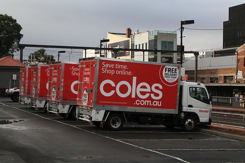 Coles Supermarket delivery trucks parked outside the Richmond South 'dark' store